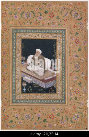 'Portrait of Shaikh Mu'in al-DIN Hasan Chishti', Folio aus dem Shah Jahan Album recto und verso: Anfang des 19th. Jahrhunderts Dieses Portrait eines sufi wird entlang der rechten Grenze als das Abbild von Shaikh Mu`in al-DIN Hasan Chishti (1141–1230) identifiziert, einem wichtigen Mitglied des Chishtiyya sufi-Ordens. Der Chishtiyya Sufi-Orden wurde 930 in Chisht, einer kleinen Stadt in der Nähe von Herat, Afghanistan, gegründet und expandierte nach Indien, als Mu'in al-DIN Hasan Chishti 1193 dorthin reiste. Seine Präsenz in Indien führte zu einer Ausweitung des Chishti-Ordens auf dem indischen Subkontinent, der lange nach seiner Entfaltung weiter florierte Stockfoto